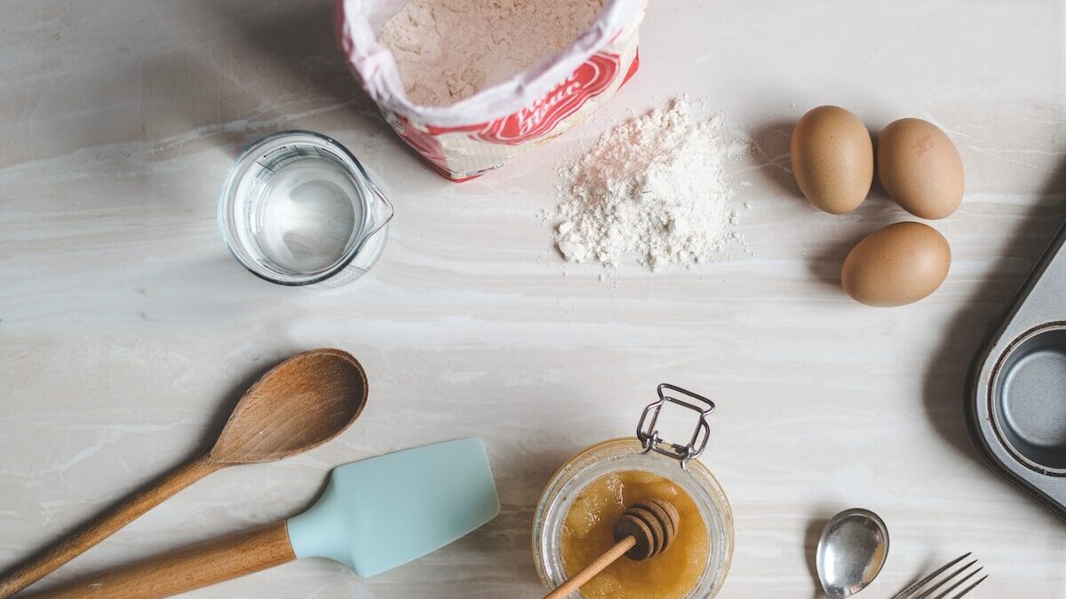 wooden ladle and spatula on top of table